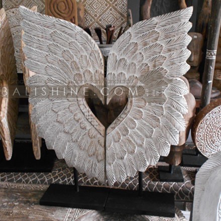 Balishine: Your natural source of indonesian handicraft presents in its Home Decor collection the Primitive Angel Wings:12VIC37788:This set of primitive standing angel wings is made in Flores, Indonesia, from natural Suar wood with curving finishing.  