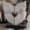 balishine This set of primitive standing angel wings is made in Flores, Indonesia, from natural Suar wood with curving finishing.