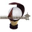 balishine This lamp is produced in Indonesia made from coconut and mahogany wood cotton bowl lampshade with a string of pineapple leaf for decoration.